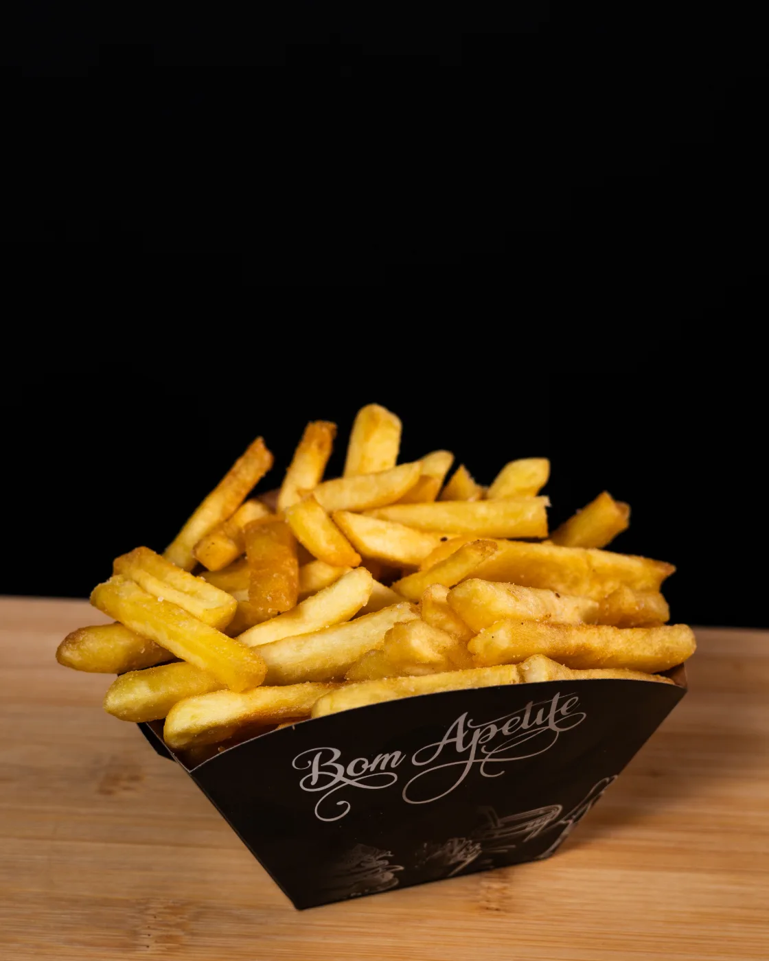 Porção grande de batata frita
