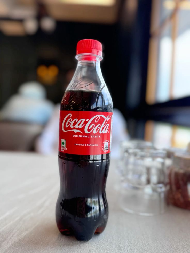Garrafa de 1 litro de Coca-Cola gelada
